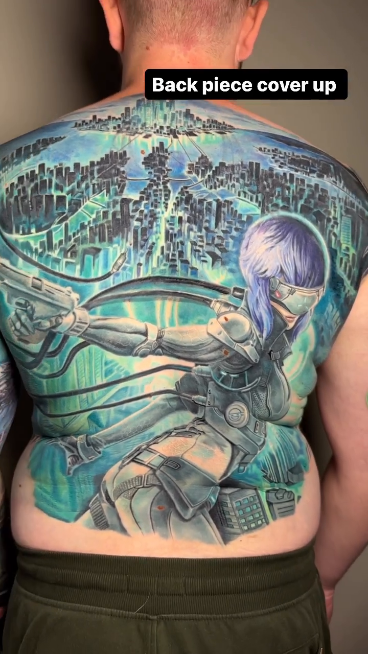 Motoko kusanagi and cityscape realism tattoo by Jamie Lee Parker