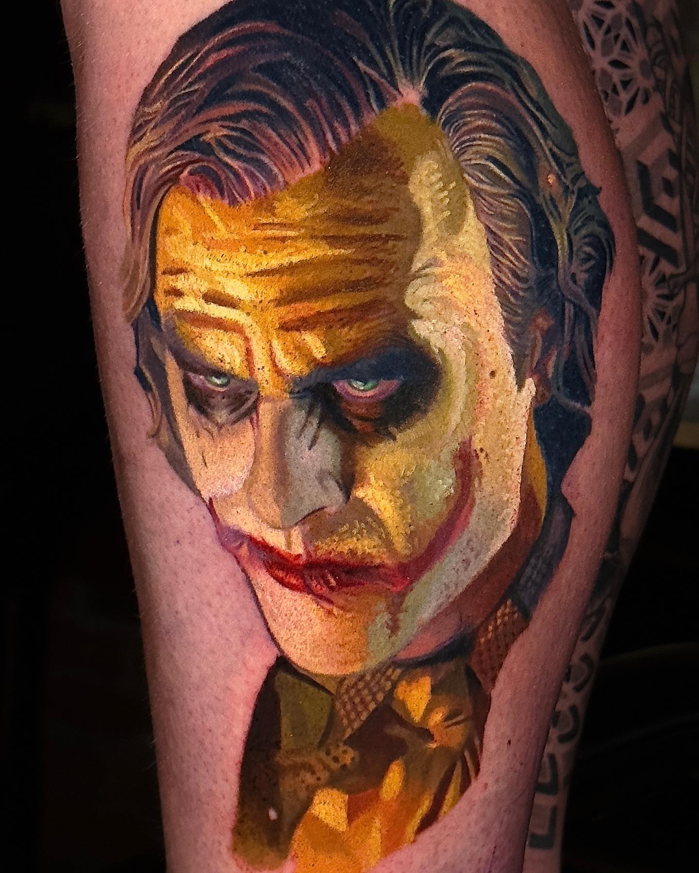 Joker realism tattoo on the forearm by Robert Morton, Cleveland, Ohio