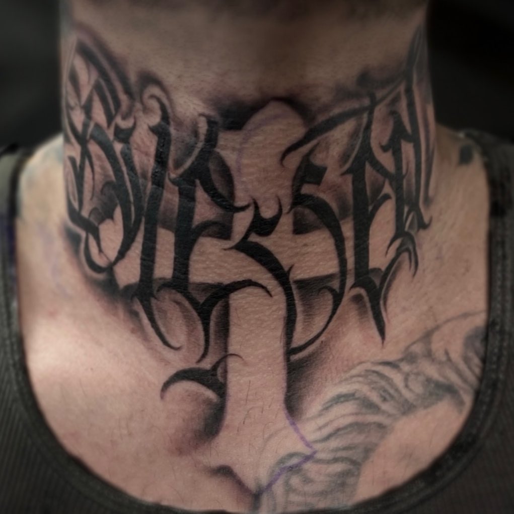 Gothic script lettering script tattoo on the neck by Amber