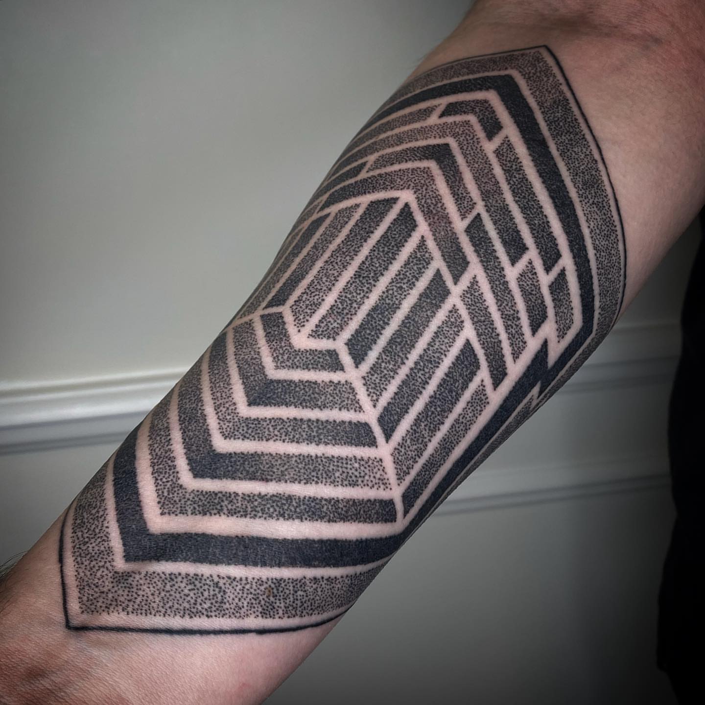 Geometric pattern dotwork tattoo on the forearm by 𝚁 𝚊 𝚢 𝚗 𝚎  ⁜  𝚁 𝚘 𝚓 𝚊 𝚜