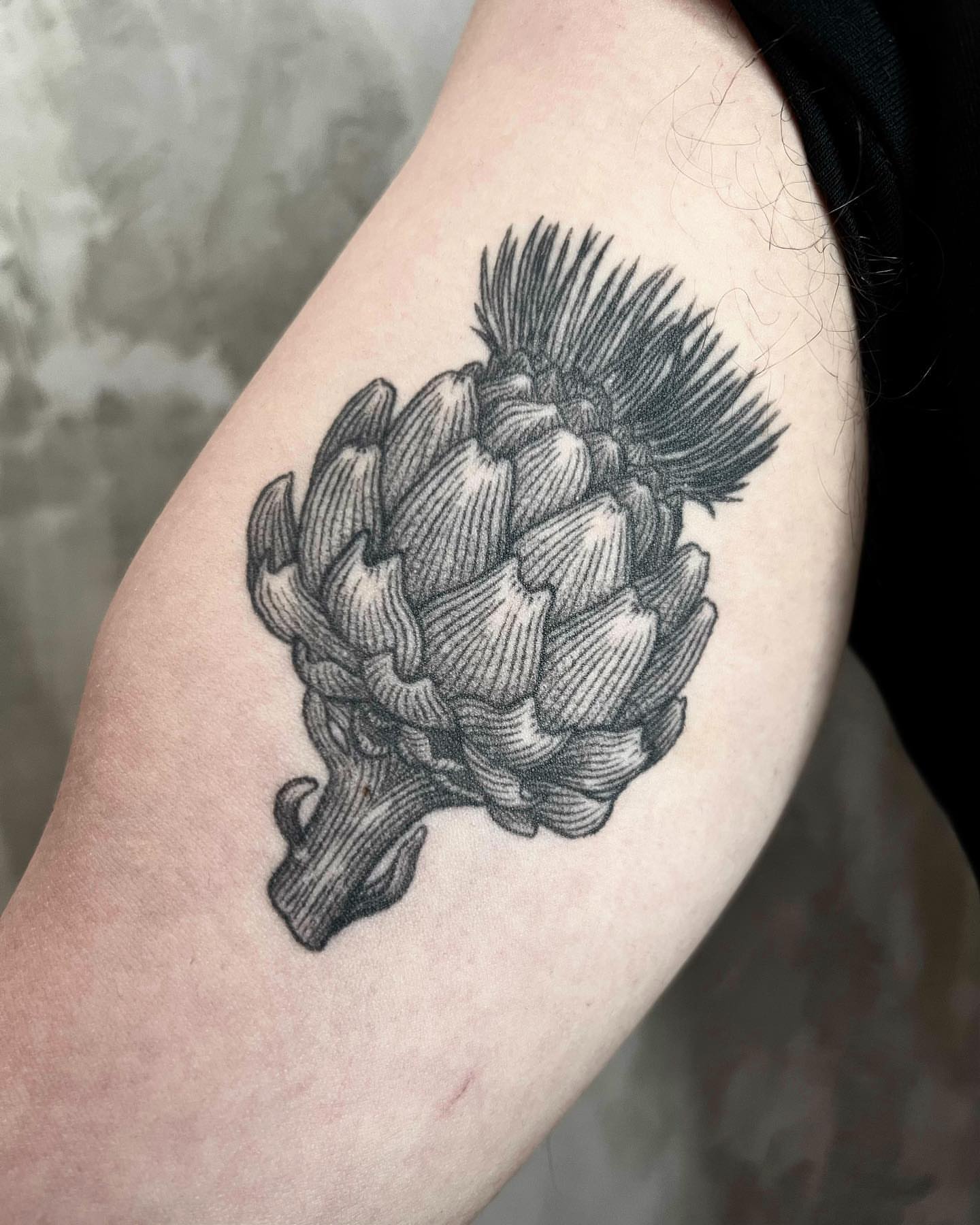 Artichoke black and grey tattoo on the forearm by Jorge Nox