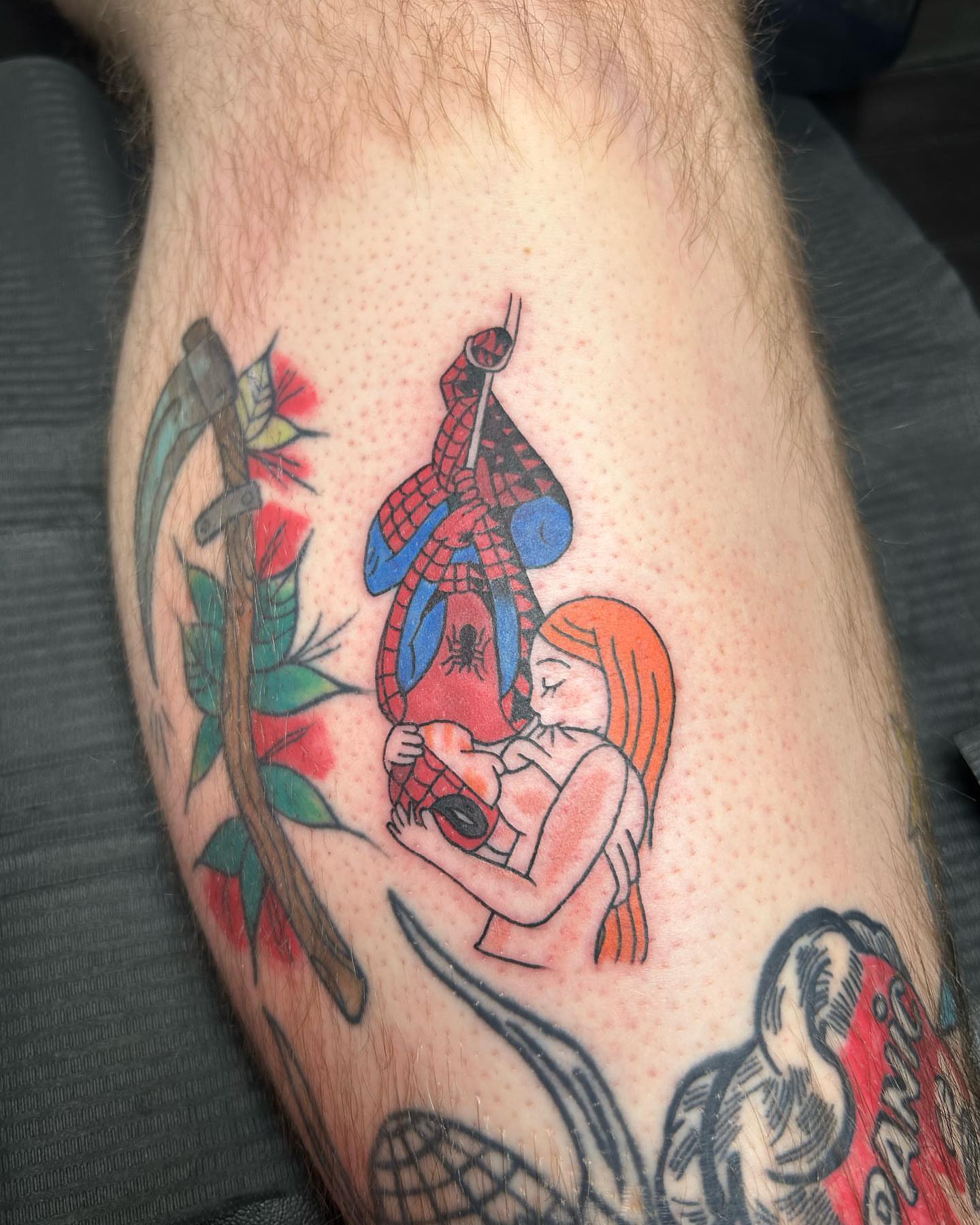 Spiderman and child American traditional tattoo on the forearm by Cameron 🩸👻