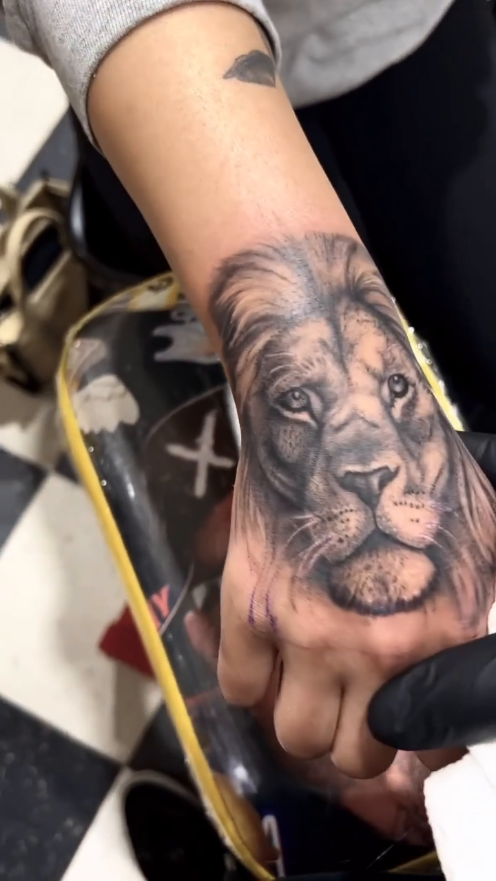 Lion portrait realism tattoo by Wolf of Wall St.