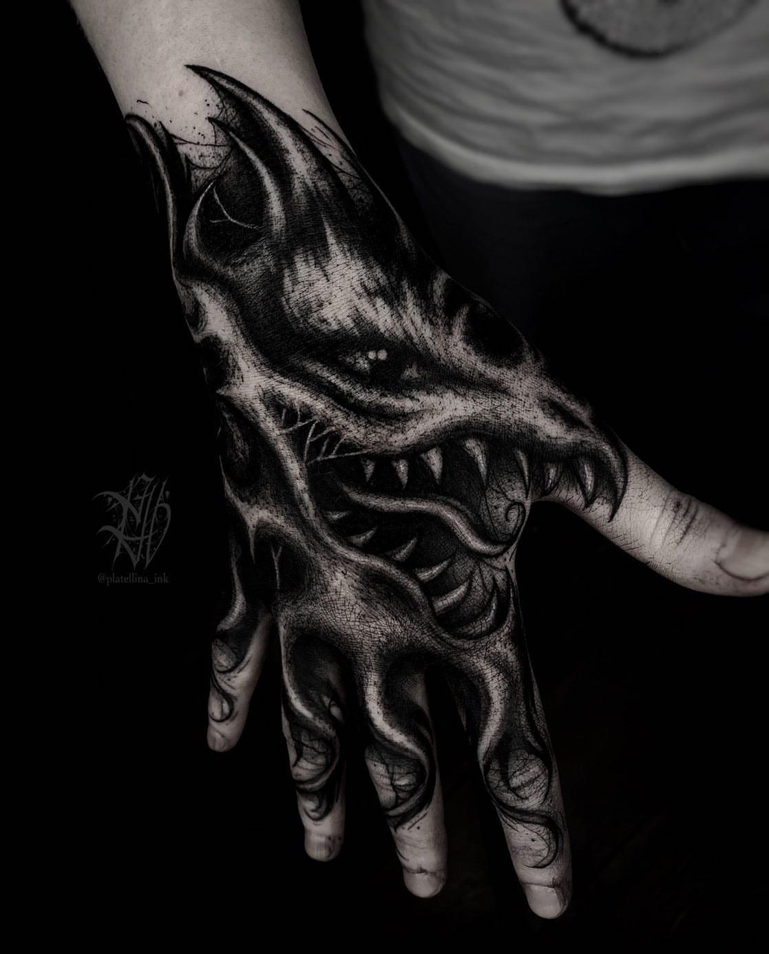 Dragon dark realism tattoo on the hand by Dark Gothic Tattoo