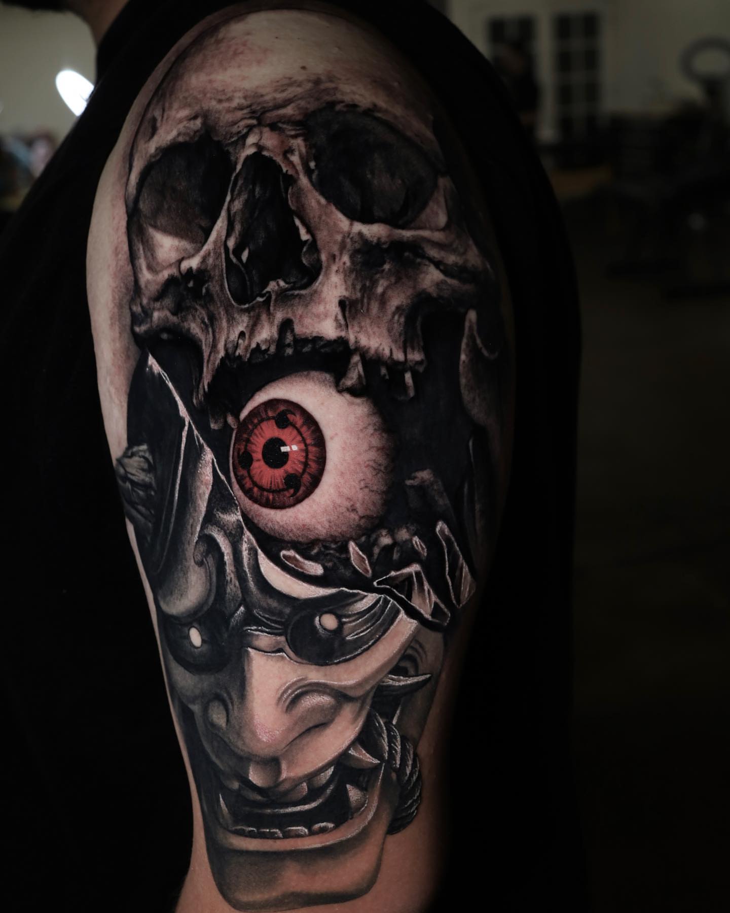 Cyborg skull dark realism tattoo on the upper arm by Gabriel Varelas, Phoenix, Arizona