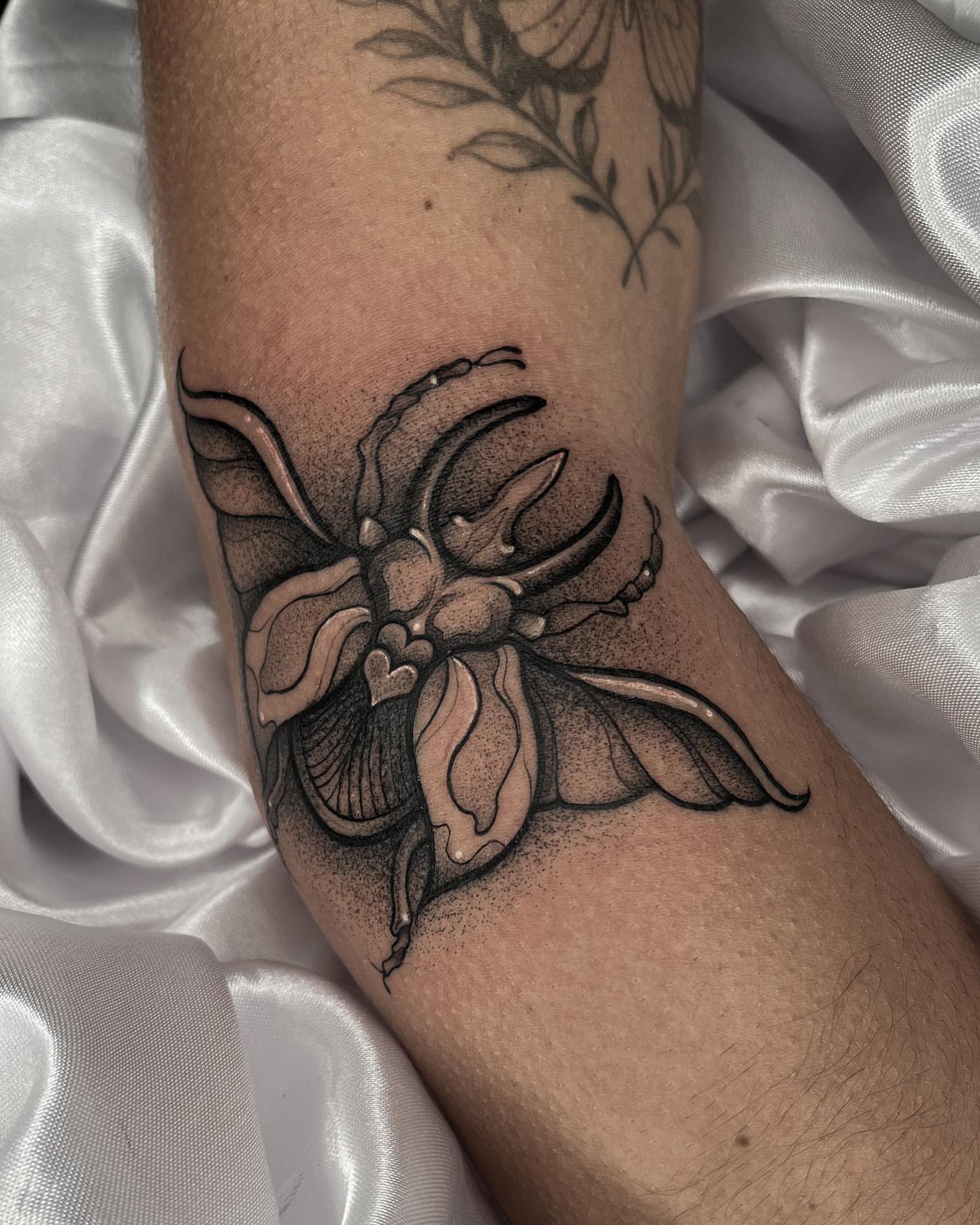 Butterfly dotwork tattoo on the forearm by Gabrieli Folha