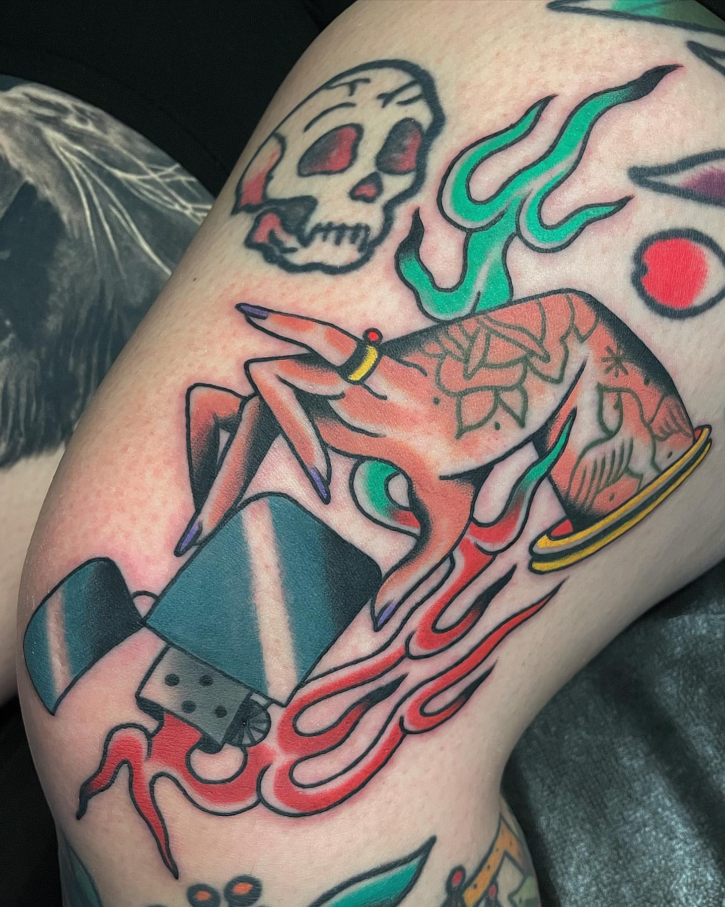 Flaming woman American traditional tattoo on the thigh by Frank Mostek