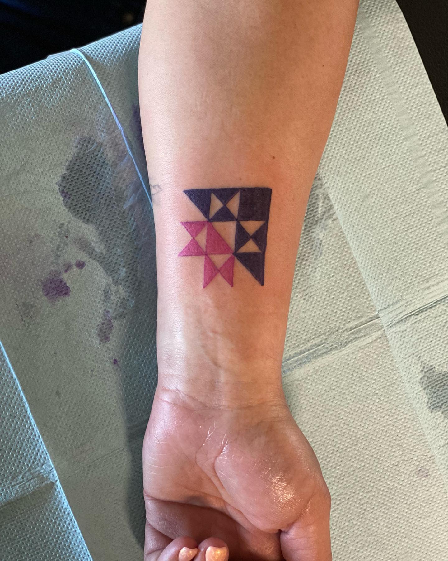 Geometric pattern geometric tattoo on the forearm by Chino's Tattoos
