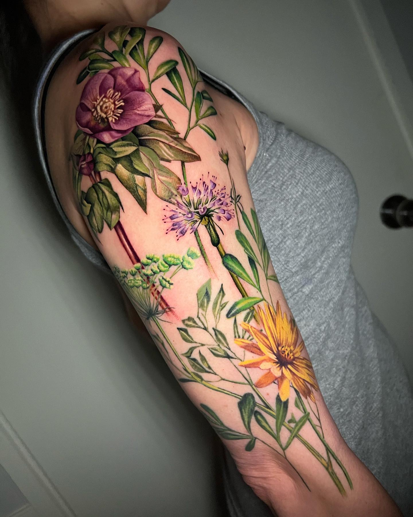 Botanical flowers realism tattoo on the forearm by Irina Shapiro, Somerville, Massachusetts