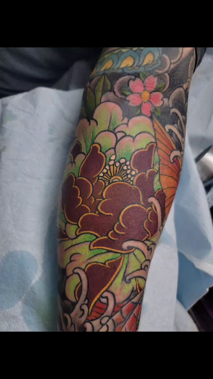 Peony and waves japanese irezumi tattoo by James Vaughn