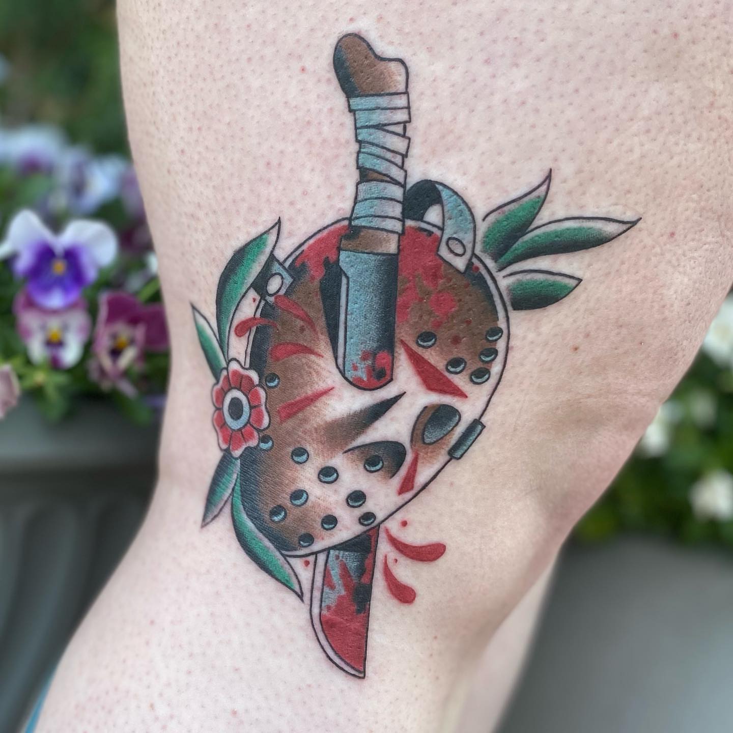 Mask with knife American traditional tattoo on the forearm by Rat Girl, Dayton, Ohio