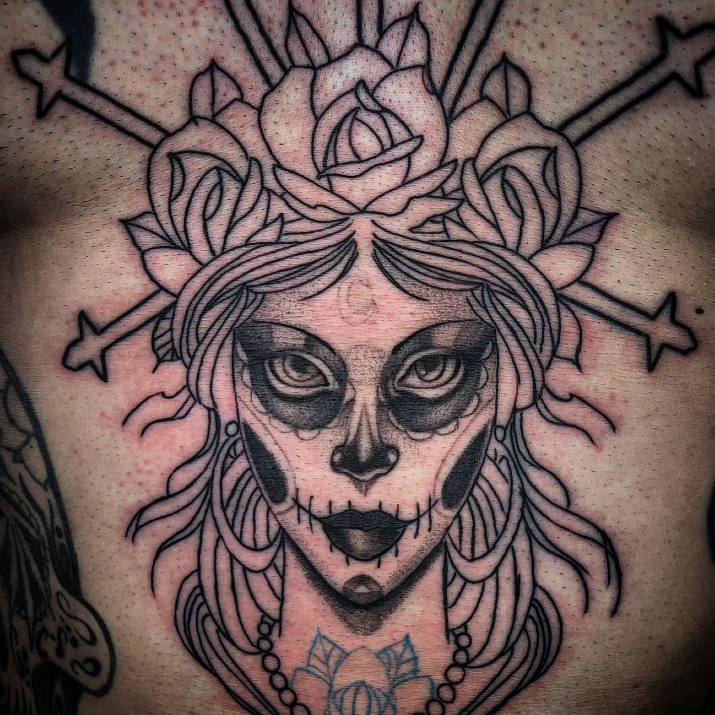 Catrina skull black and grey tattoo on the chest by TattoosbyPhatboi