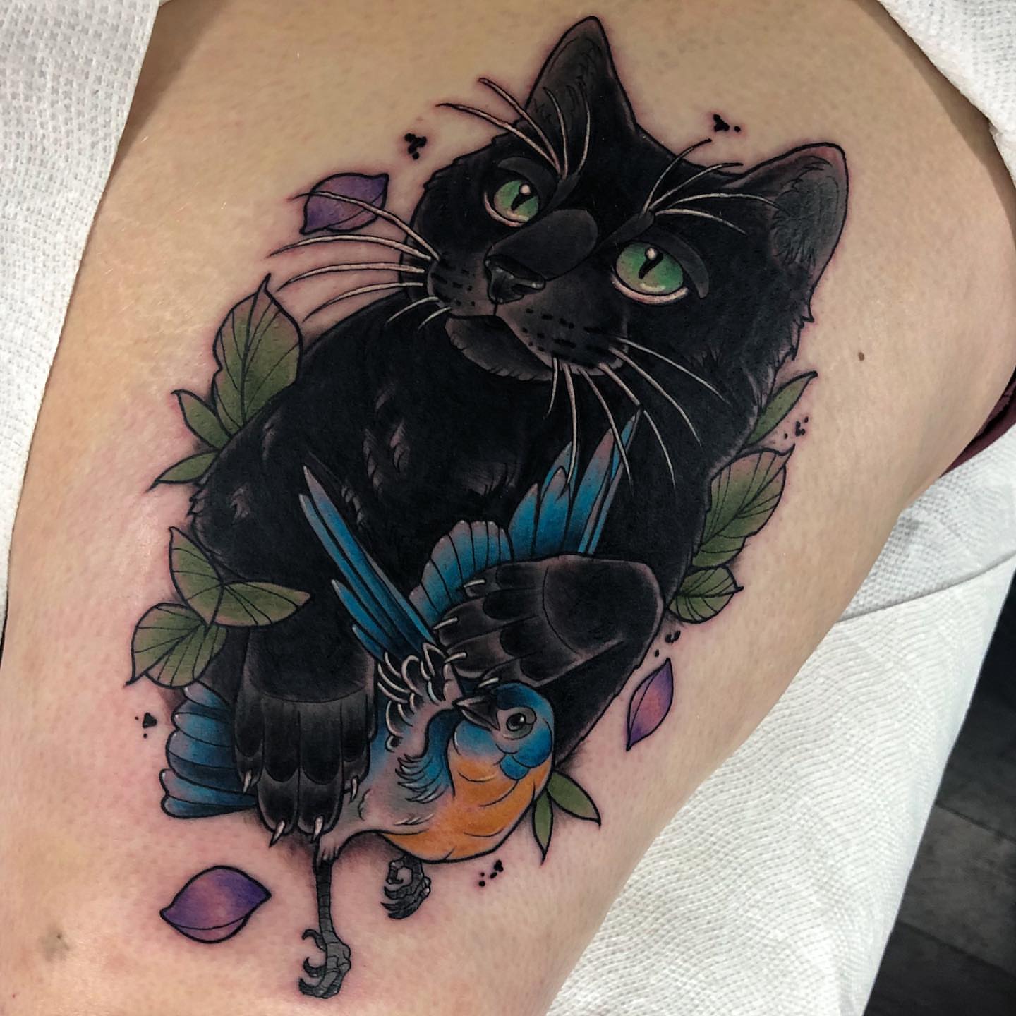 Black cat and bird realism tattoo on the thigh by 🍃  𝑳𝒆𝒆 𝑴𝒖𝒍𝒍𝒆𝒏  🍂, Seattle, Washington