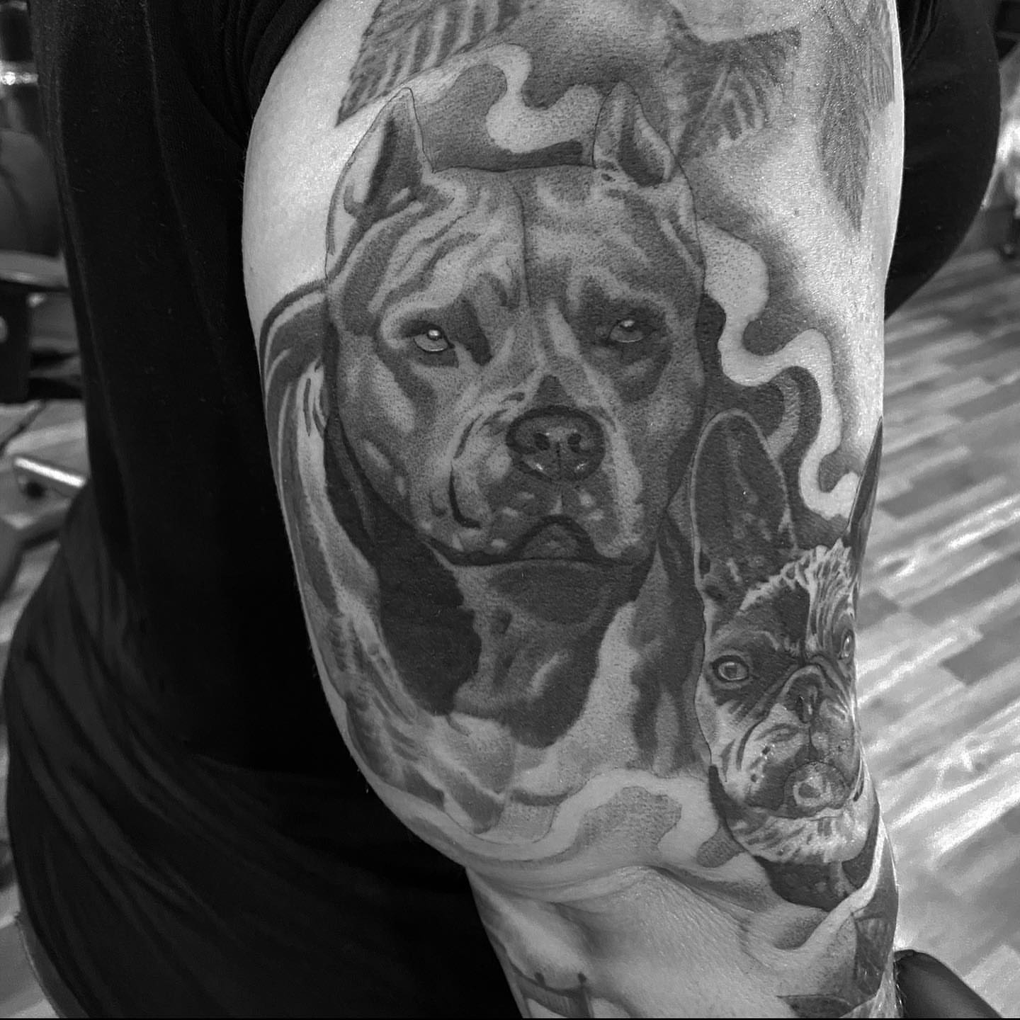 Dogs realism tattoo on the forearm by Alex Cruz 707