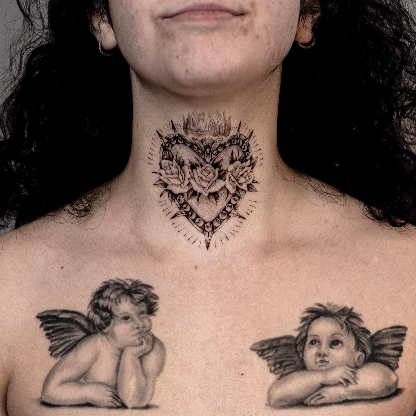 Cherubs and heart realism tattoo on the chest by Chriscalibur