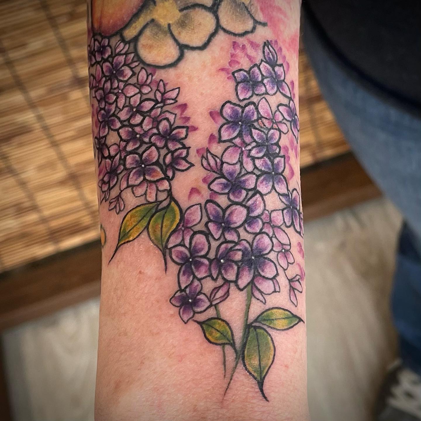 Lilac flowers dotwork tattoo on the forearm by Brianna, Portland, Oregon