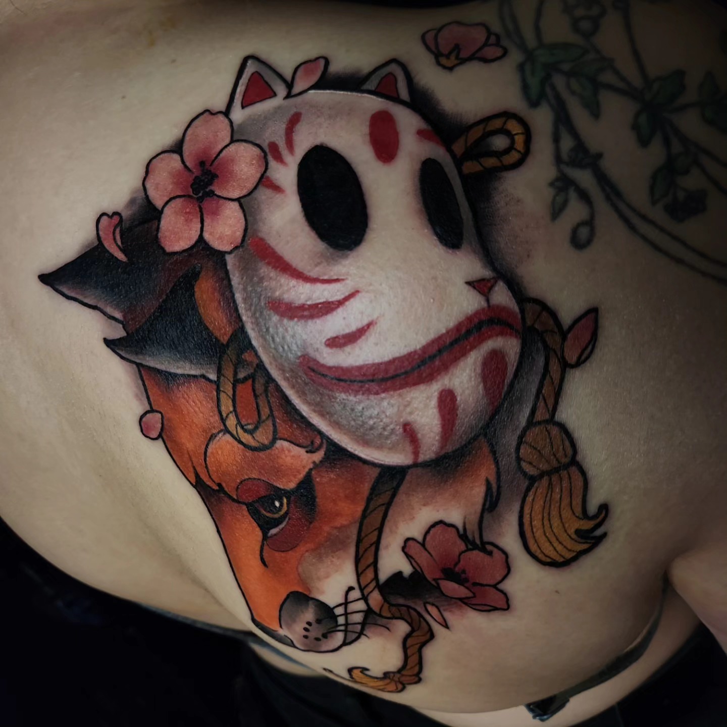 Cat-like creature American traditional tattoo on the chest by Ben Friday, Phoenix, Arizona