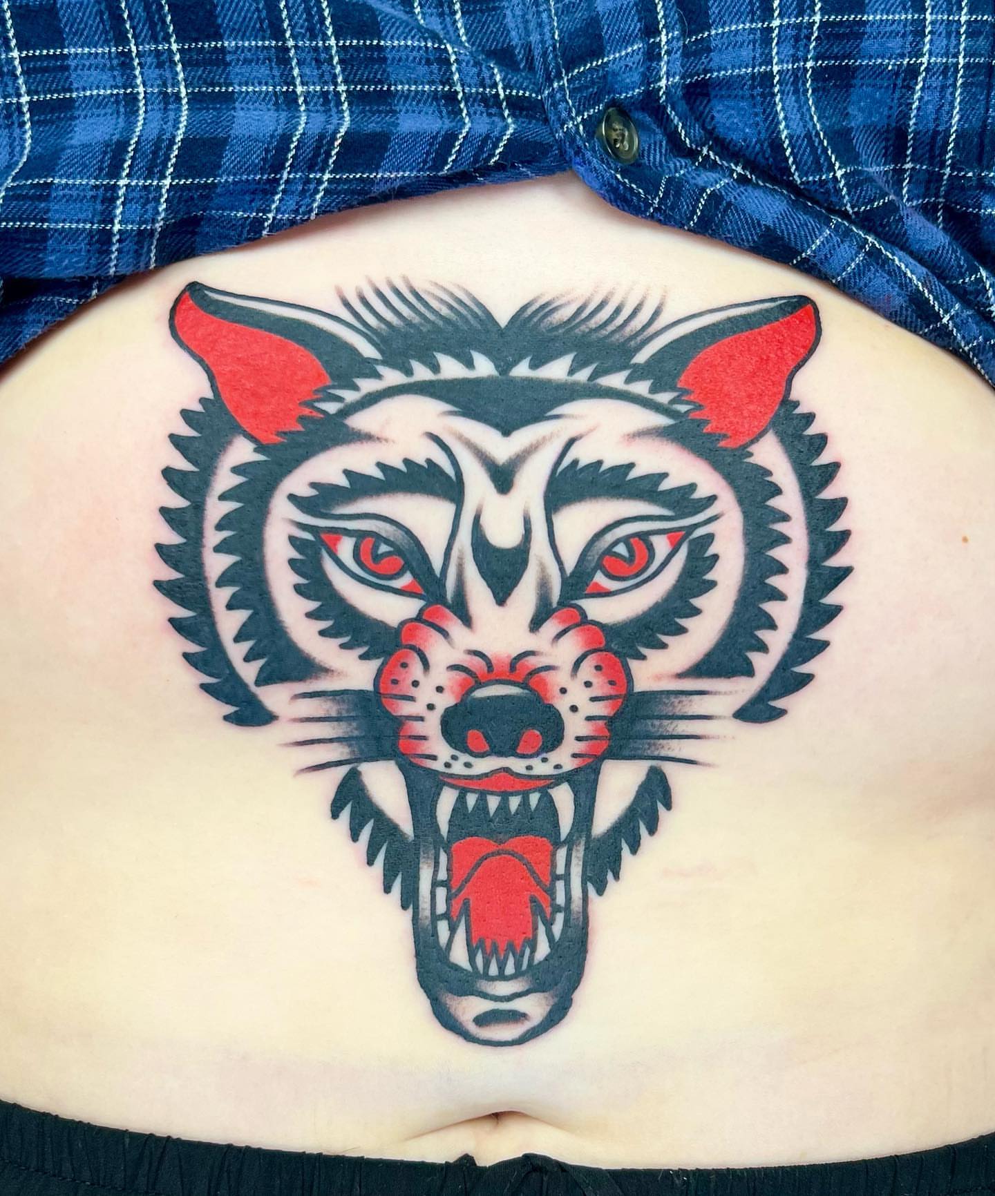Wolf American traditional tattoo on the ribs by Nicholas Mella, Nashville, Tennessee