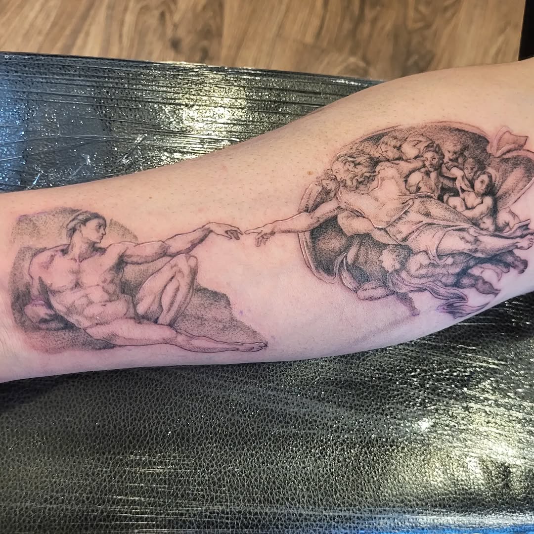 The Creation of Adam sketch tattoo on the forearm by Sooz, Tours, Centre-Val de Loire