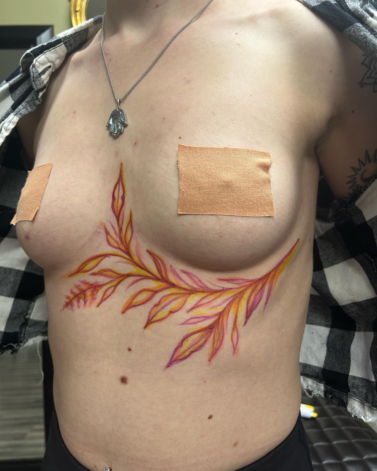 Feather new school tattoo on the chest by ππππππ ππππππ