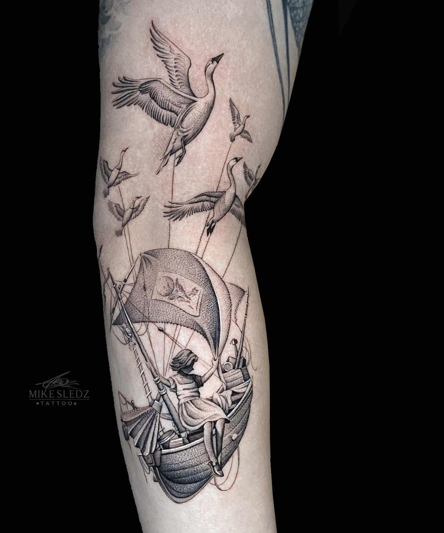 Boat with woman and birds realism tattoo on the forearm by ✶ MIKE SLEDZ ✶ Chicago Tattoo Artist