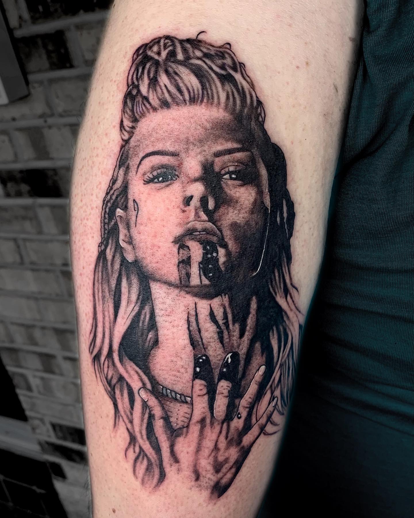 Woman realism tattoo on the forearm by Storm