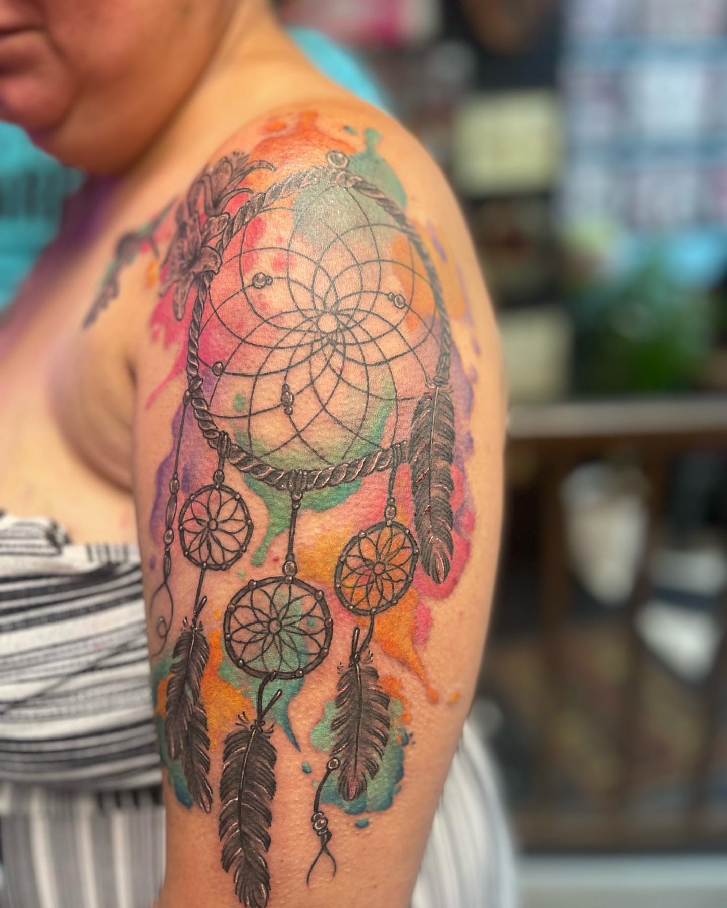 Dreamcatcher dotwork tattoo on the shoulder by Edward Choat
