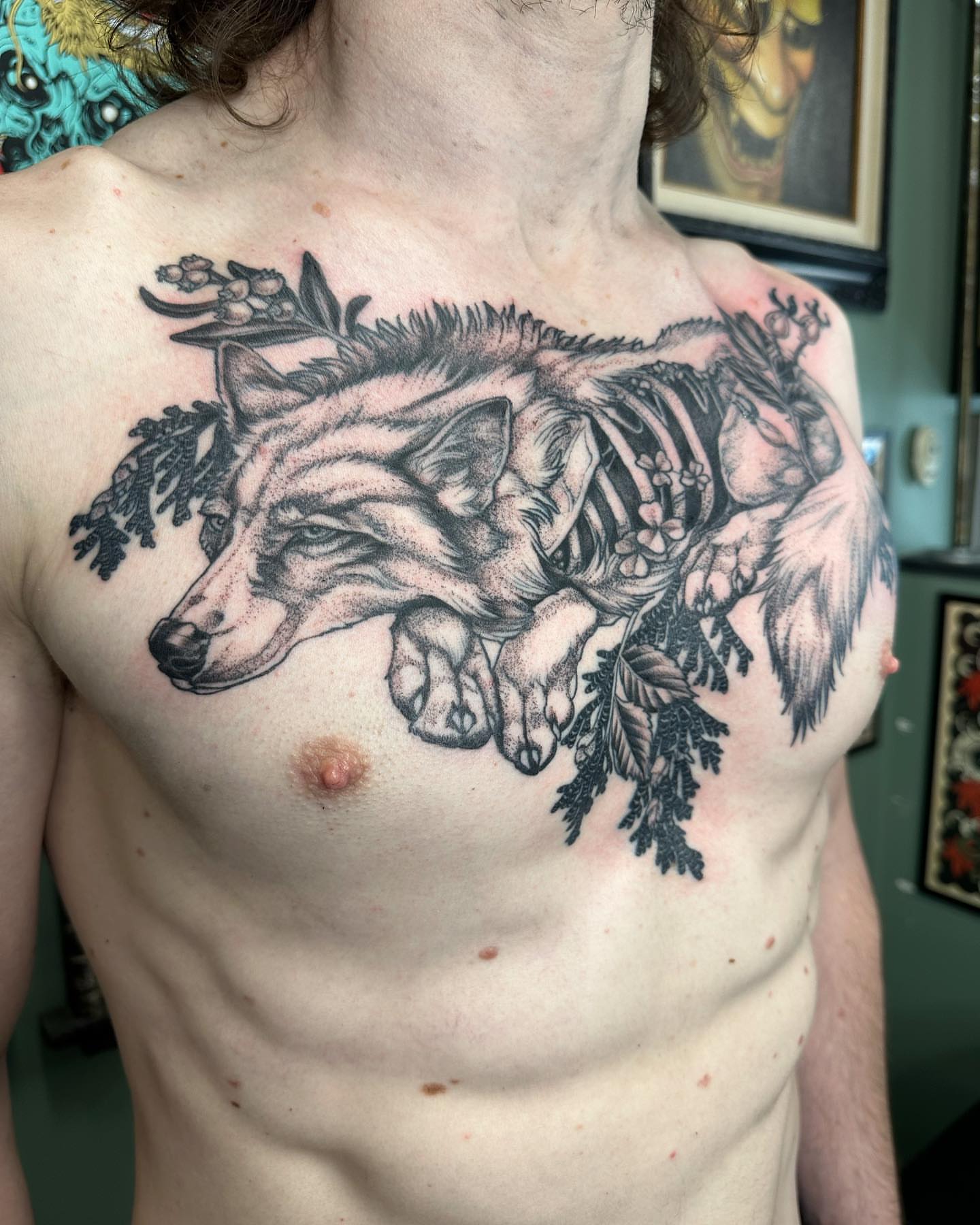 Wolf skeleton dotwork tattoo on the chest by Cassidy Depew, Seattle, Washington