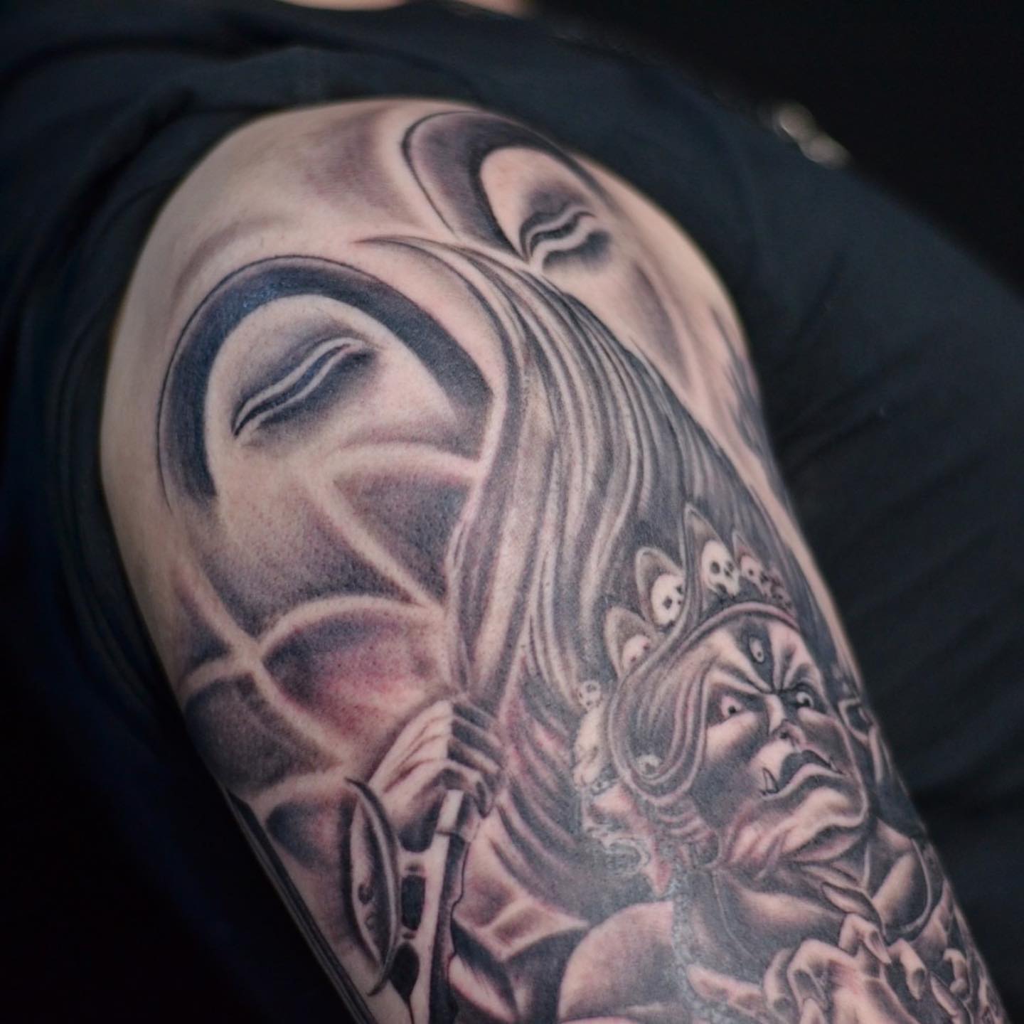 Woman with ghostly face realism tattoo on the forearm by Ksu Storm, San Francisco, California