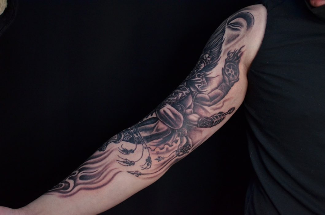 Warrior with sword black and grey tattoo on the forearm by Ksu Storm, San Francisco, California