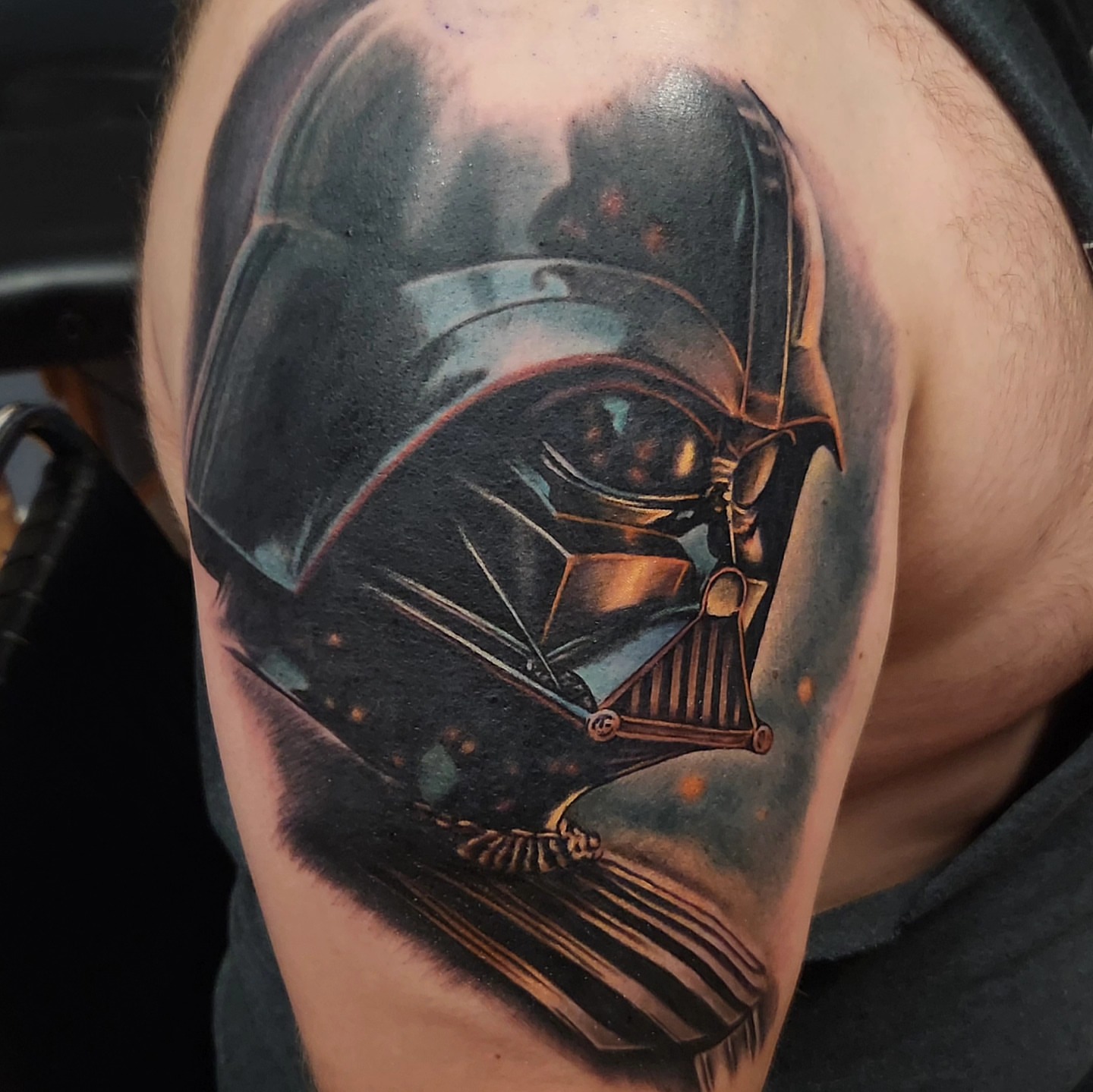 Darth vader helmet dark realism tattoo on the shoulder by Don Taylor