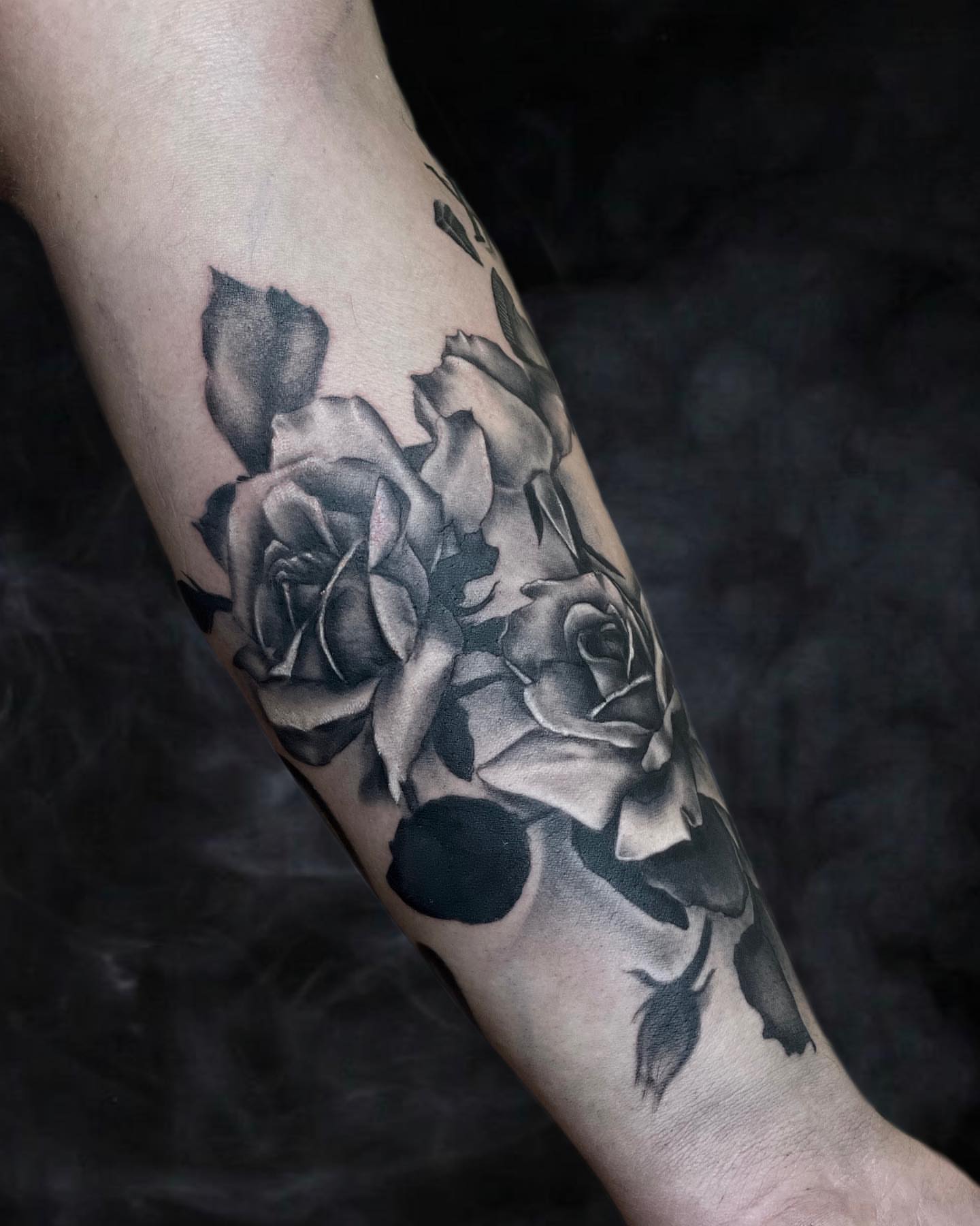 Roses realism tattoo on the forearm by Ksu Storm, San Francisco, California
