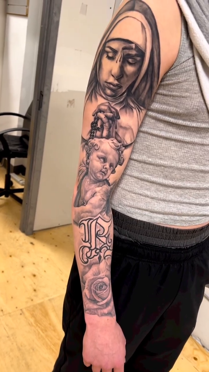 Tattoo by @mannyfacestattoo — realism, black_and_grey