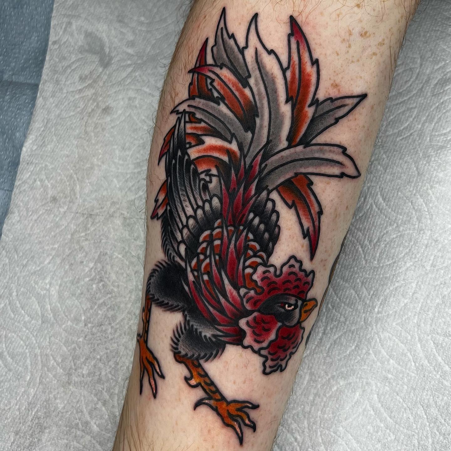 Rooster American traditional tattoo on the forearm by Clayton - TRADITIONAL TATTOOS
