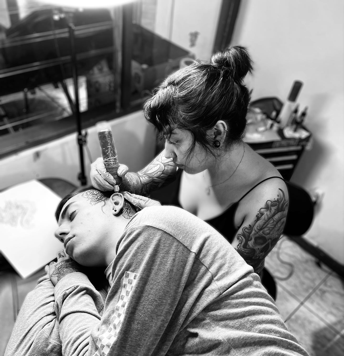 Headpiece black and grey tattoo on the head by Brisia Cisneros