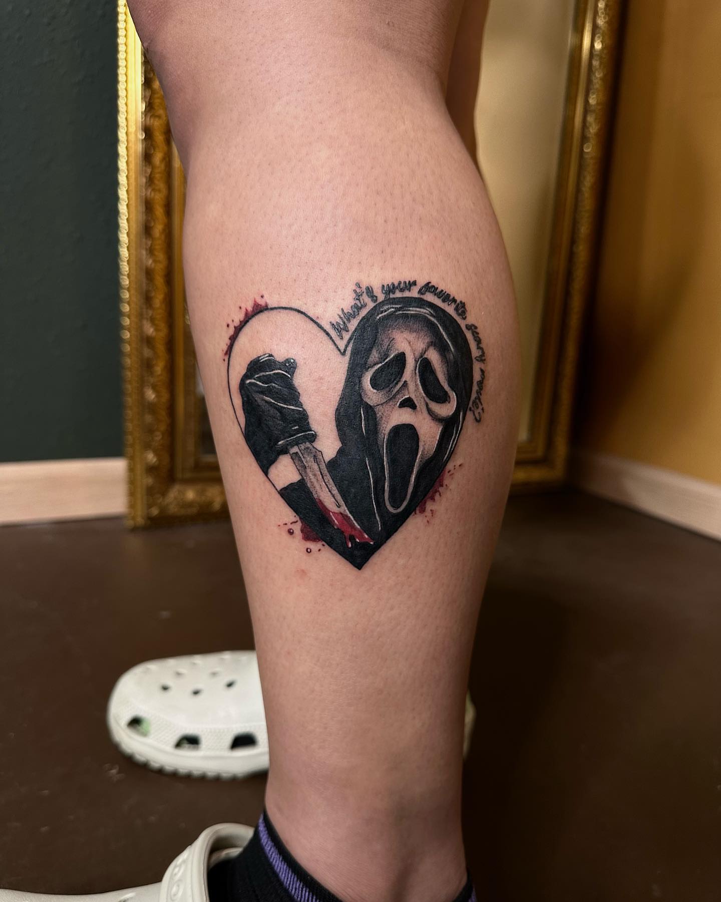 Scream ghost mask dark realism tattoo on the thigh by Leo Torres