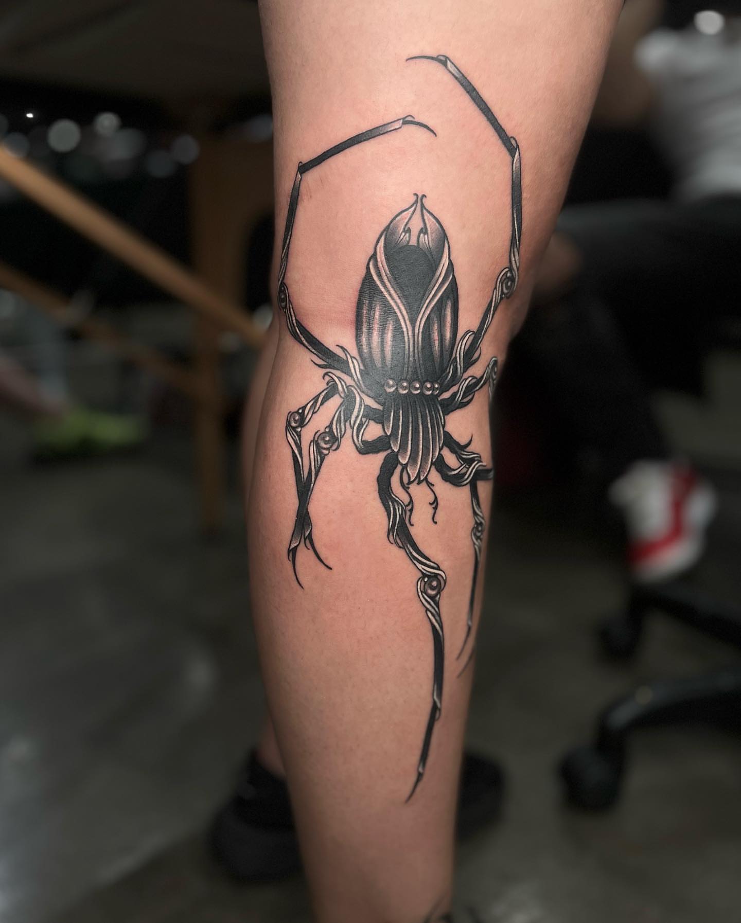 Beetle black and grey tattoo on the forearm by Myla Jane, Houston, Texas