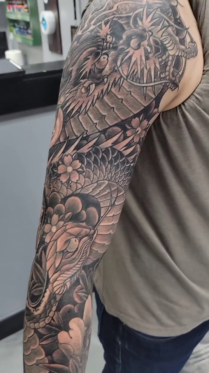 Tattoo by @mrjamesvaughn — japanese_irezumi, black_and_grey