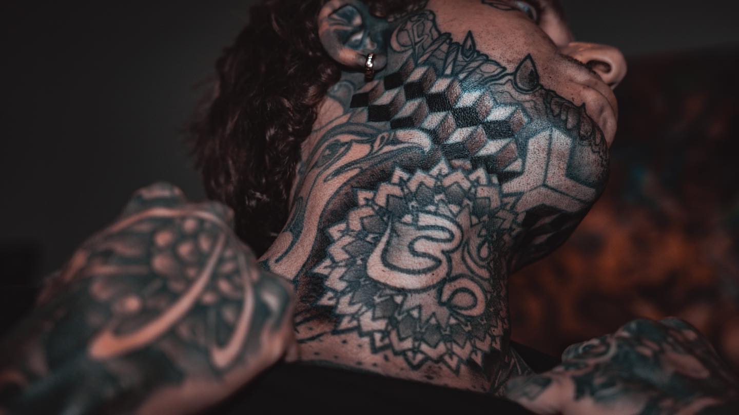 Geometric pattern geometric tattoo on the neck by Ryan K Severe