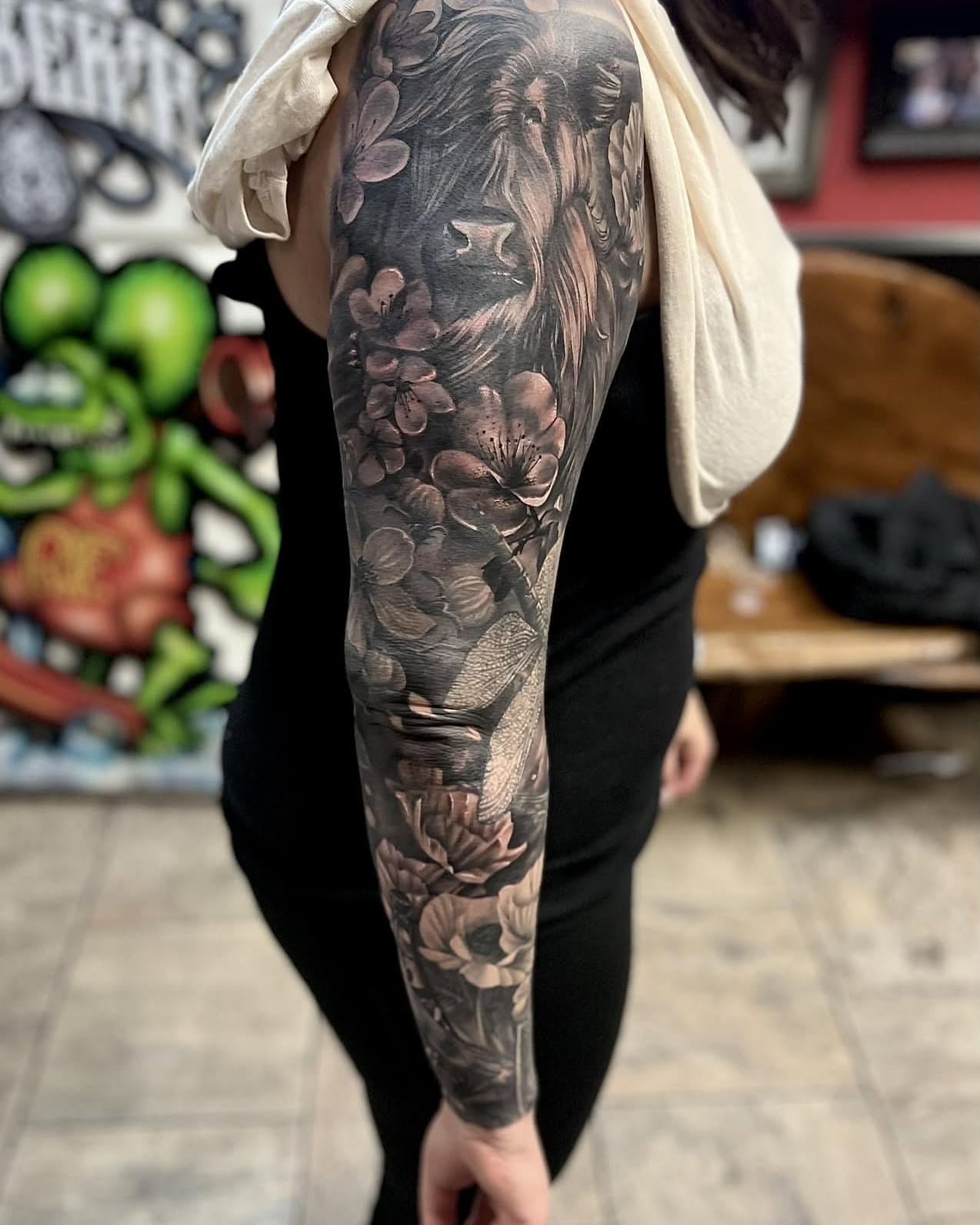 Tattoo by @leftycolbert_official — realism, black_and_grey
