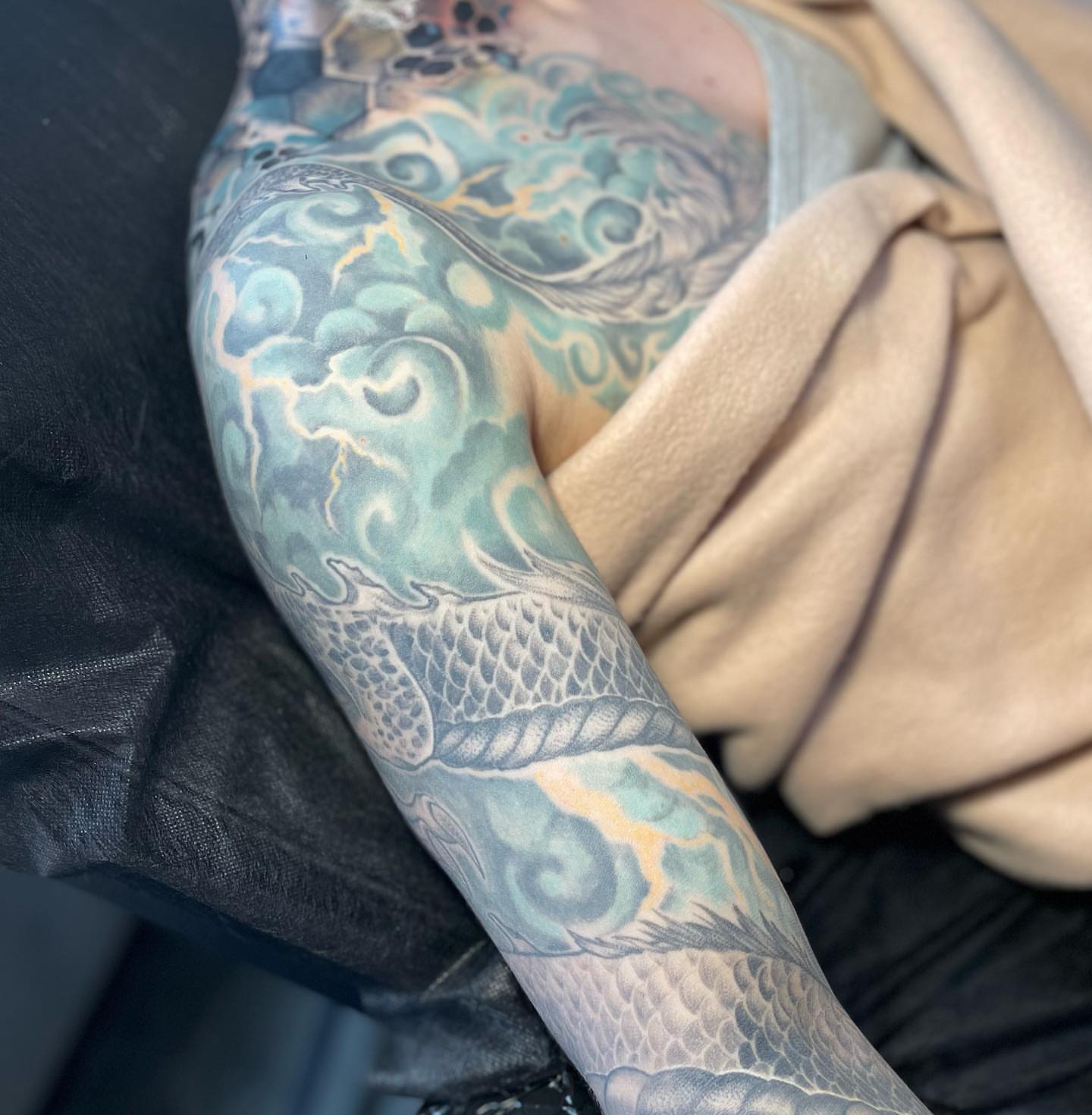 Koi fish japanese irezumi tattoo on the forearm by Ksu Storm, San Francisco, California
