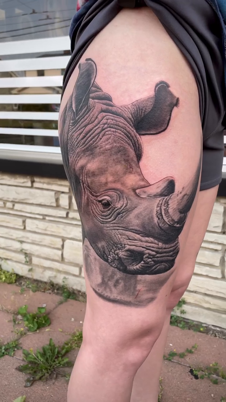 Rhinoceros head realism tattoo by Charlie