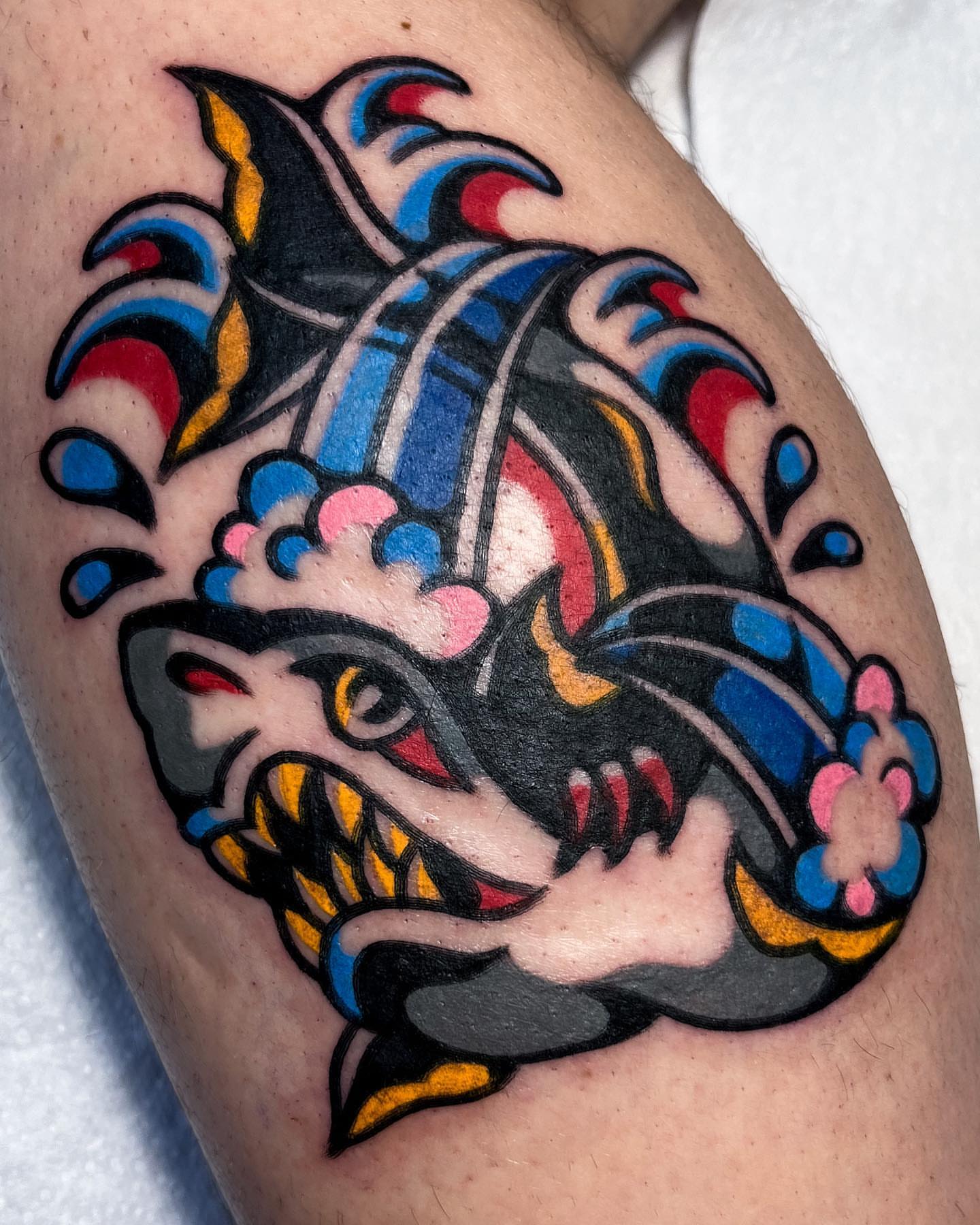 Fish American traditional tattoo on the thigh by Oldschool Tattooer Takii 타키