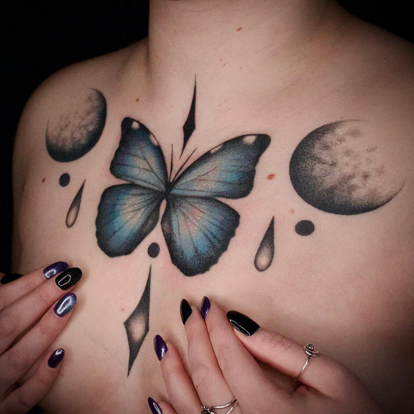 Butterfly realism tattoo on the chest by Galen