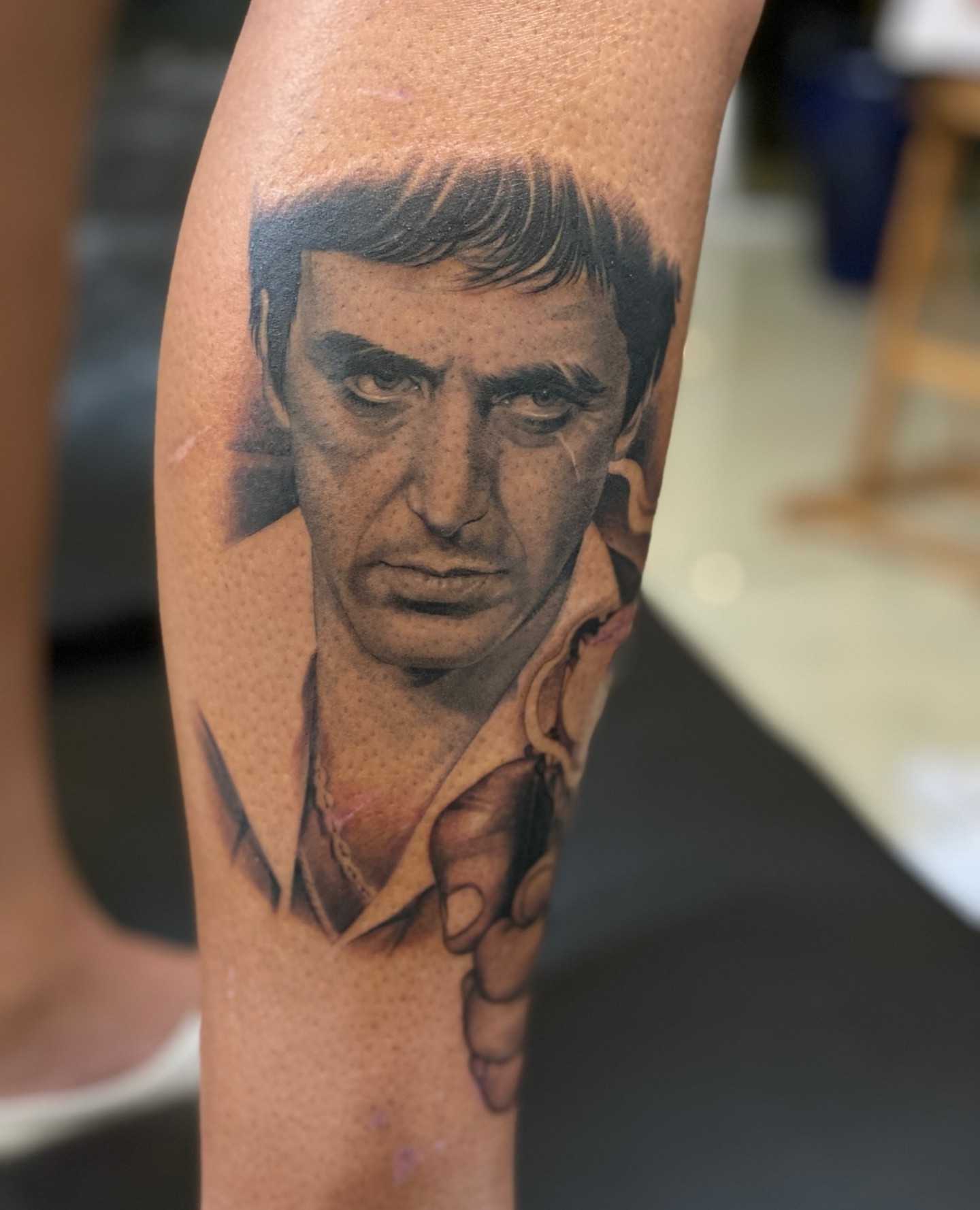Man's face realism tattoo on the forearm by Anthony Michaels, Tucson, Arizona