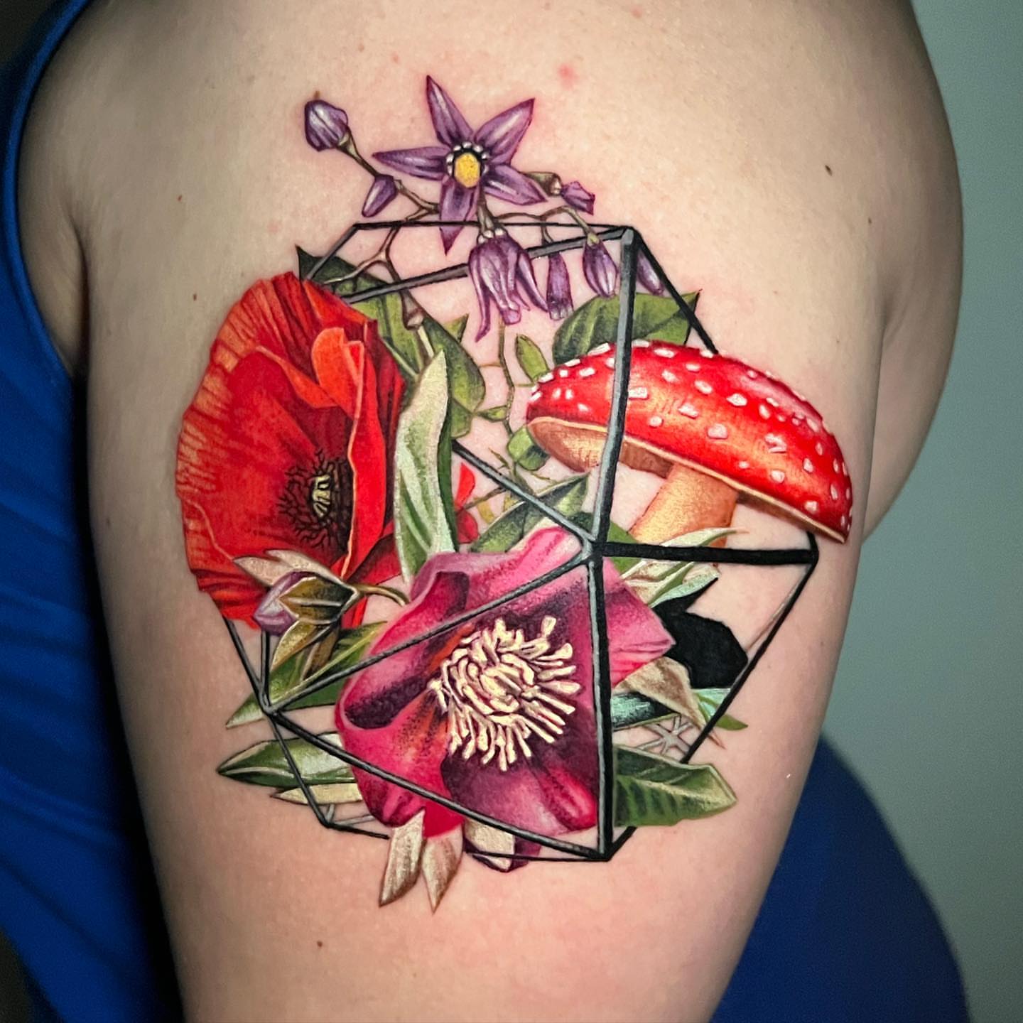 Geometric floral arrangement geometric tattoo on the shoulder by Irina Shapiro, Somerville, Massachusetts