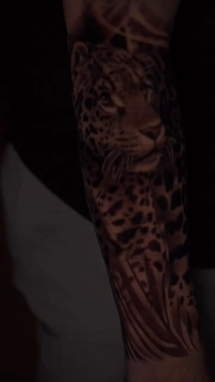 Leopard head realism tattoo by Ryan Gage Gonzalez