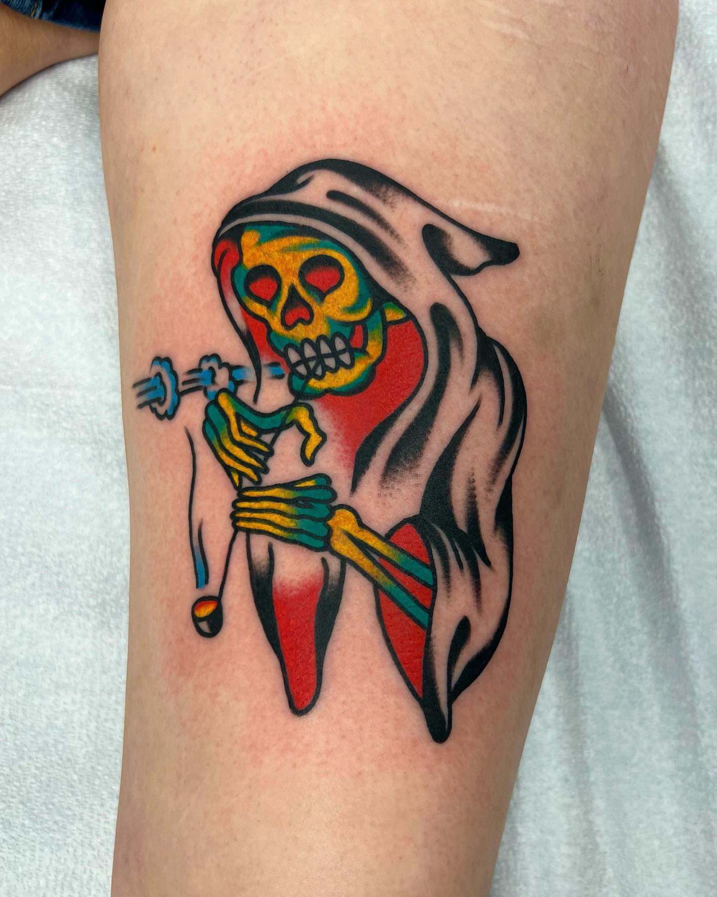 Skeleton with skull American traditional tattoo on the thigh by Nicholas Mella, Nashville, Tennessee