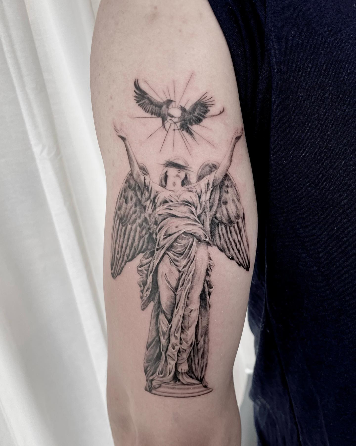 Tattoo by @oori_tattoo — realism, black_and_grey