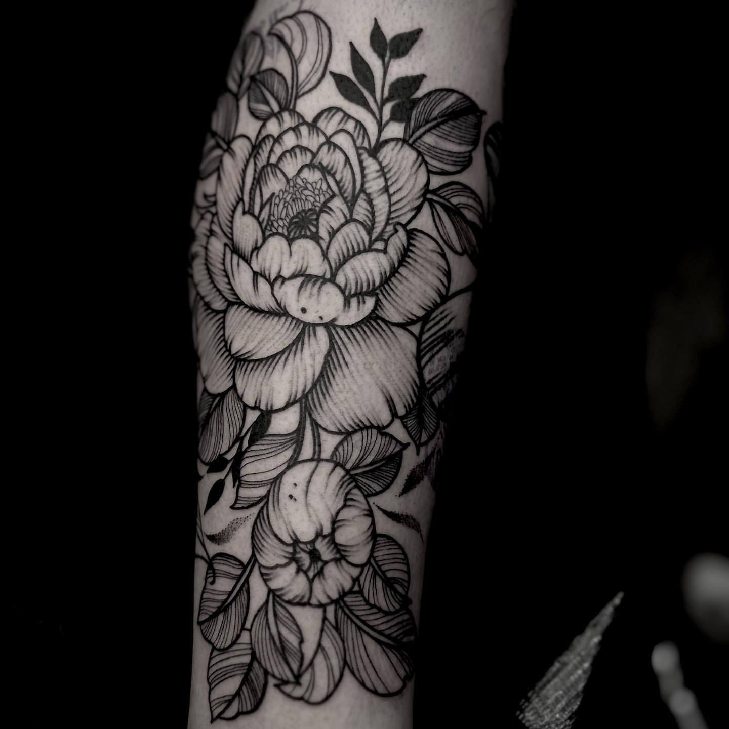 Peony flowers black and grey tattoo on the forearm by t a y l o r